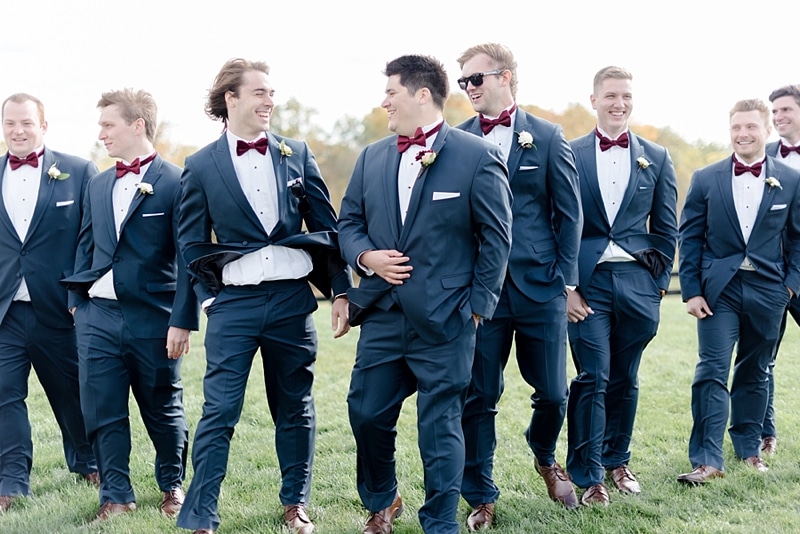 Groomsmen laughing with groom in Purcellville, VA
