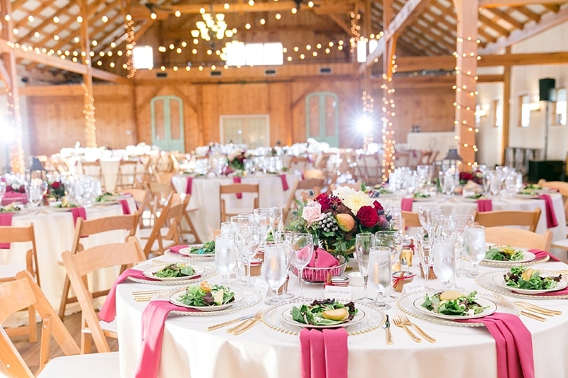 Guest tables and barn of Shadow Creek Weddings and Events