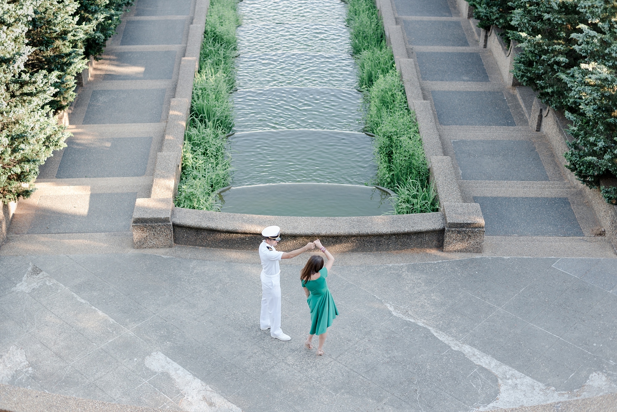 Couple twirling and dancing at Meridian Hill Park