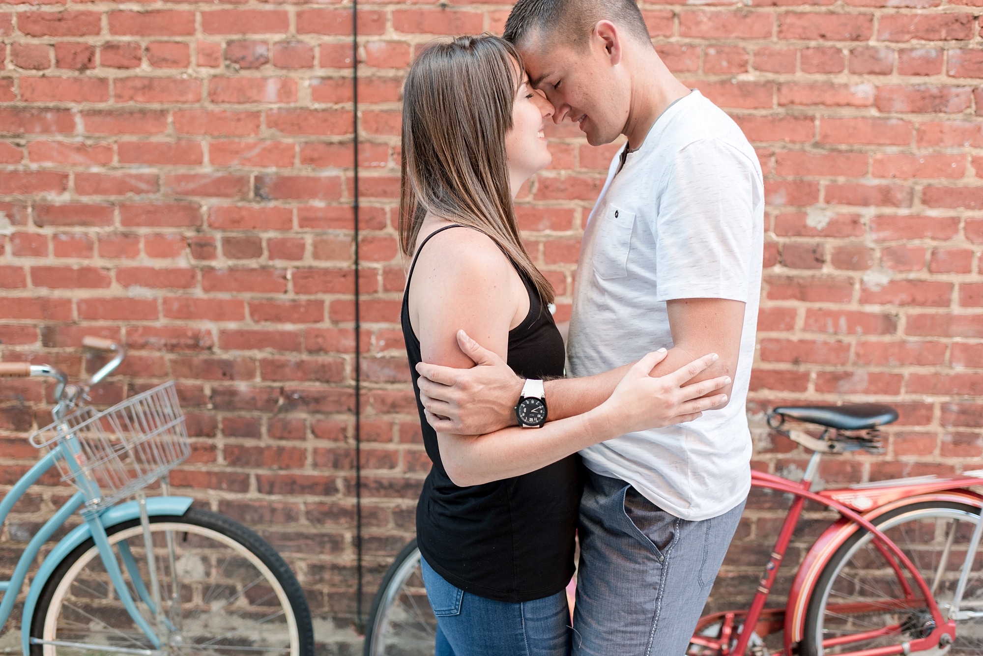 Engaged couple and their vintage bicycles 