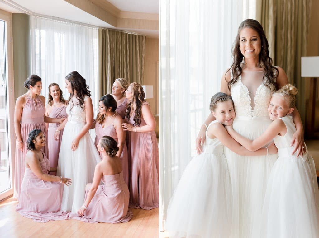 Bride with her bridesmaids and flower girls while getting ready