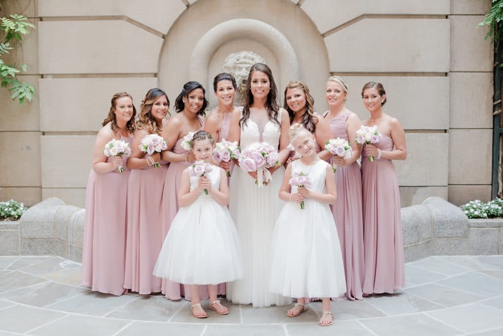Bride and bridesmaids at courtyard of Westin Georgetown Hotel
