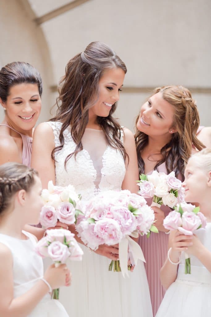 Bride and her bridesmaids and flower girls
