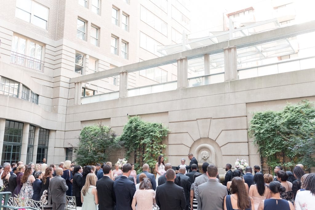 Wedding ceremony at The Westin Georgetown in courtyard of hotel