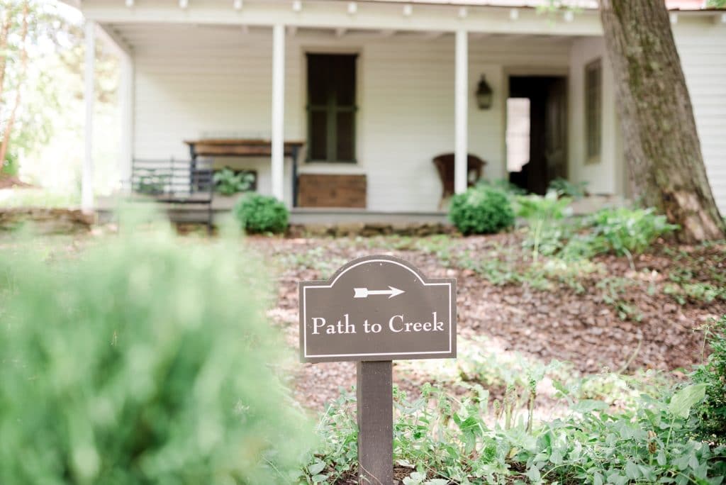 The path to creek sign at The Mill at Fine Creek