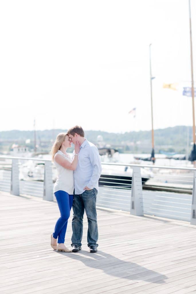 pier and boats at navy yard engagement session