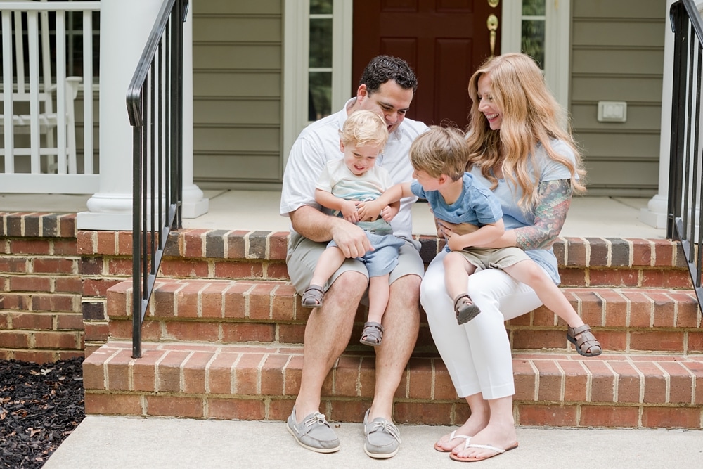 Family sitting on front porch in Fredericksburg VA family session
