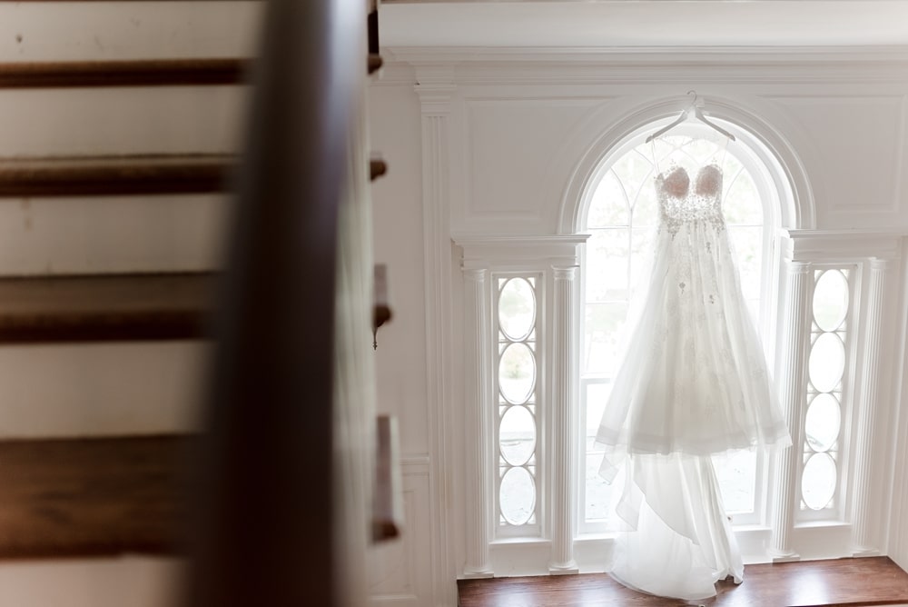 Bridal gown hanging inside Rust Manor House in Leesburg VA