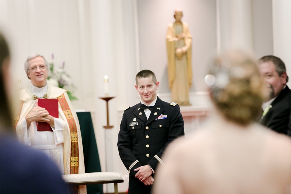 Groom seeing bride at Saint Stephen the Martyr Catholic Church ceremony in Middleburg VA