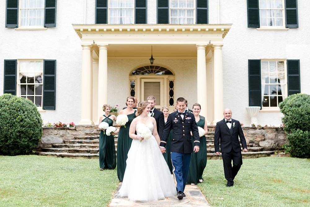 Bridal party walking together at Rust Manor House wedding