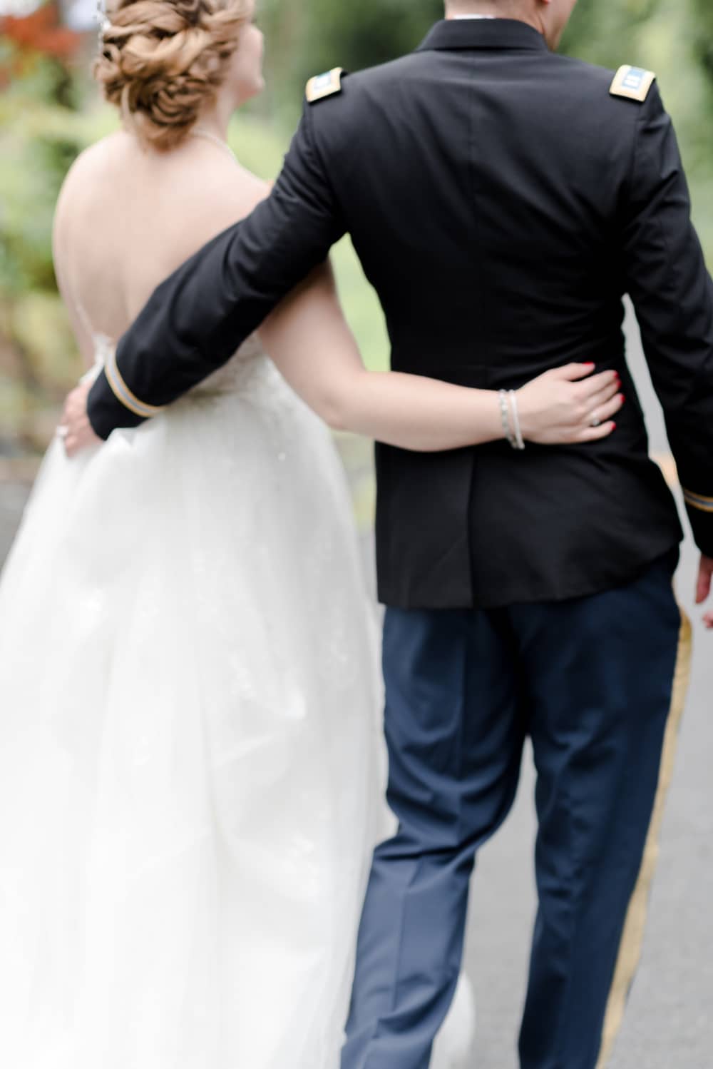 Bride and groom walking together at Rust Manor House wedding in Leesburg VA