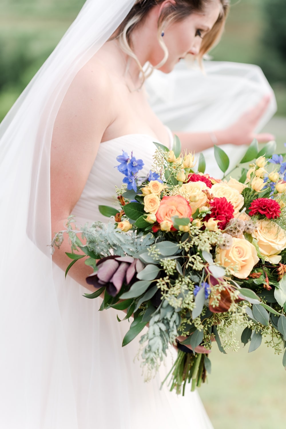 Bridal bouquet by Good Earth Flowers at styled session at DelFosse Winery