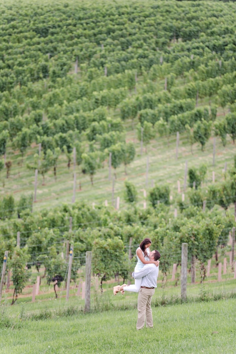 Couple during engagement photo session in Loudoun County's Blue Valley Vineyard