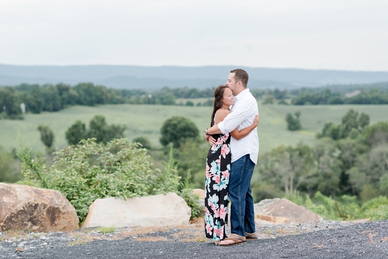 Couple holding each other during engagement photo session in Loudoun County
