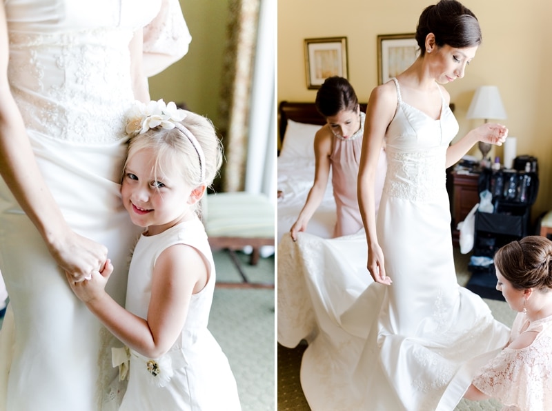 Flower girl and bride with sisters while getting ready