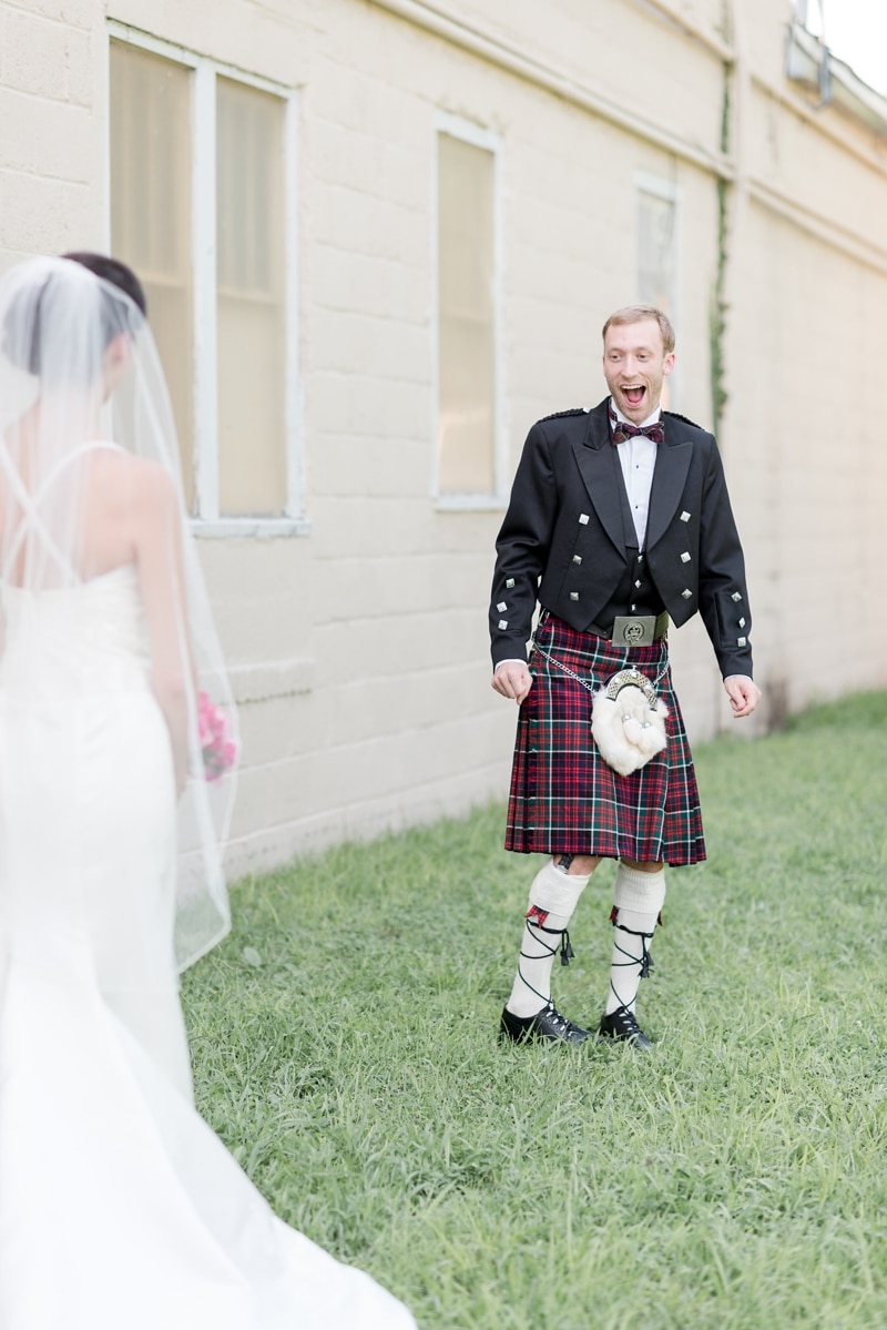 First look reaction at Inn at Old Silk Mill wedding Wolfcrest Photography