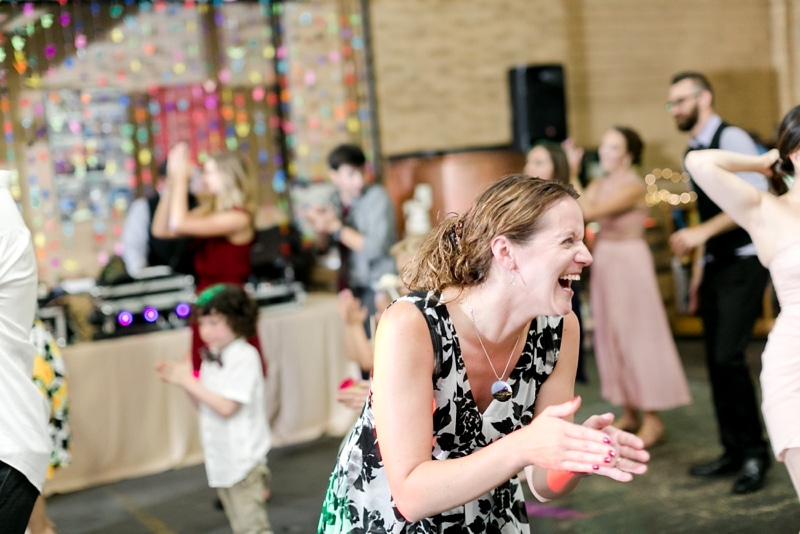 Guests laughing at wedding reception at Bowman Distillery