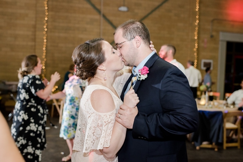 MOH and her husband kissing and dancing at Fredericksburg VA wedding