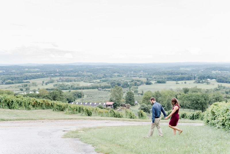 Couple walking at engagement session in Loudoun County