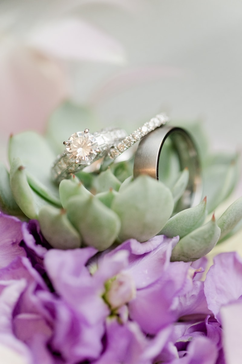 Wedding rings on florals by The City Florist in MD
