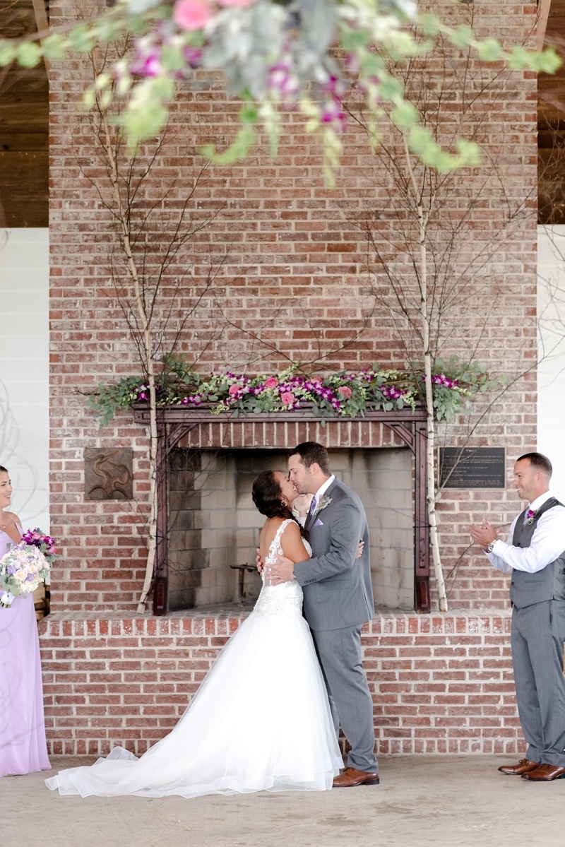 The first kiss during their wedding ceremony at Hyatt Regency Chesapeake Bay