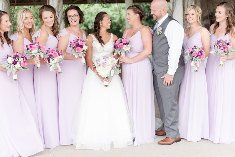 Orchid pink bridesmaid dresses and florals by The City Florist