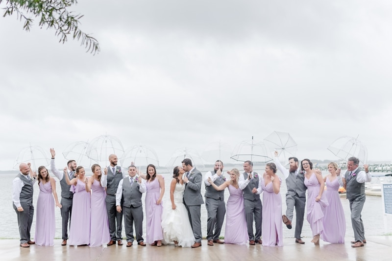 Bridal party under umbrellas at Hyatt Regency Chesapeake Bay