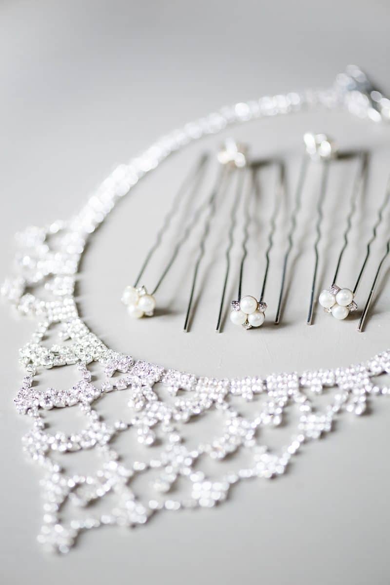 Bridal details hair pins and necklace getting ready