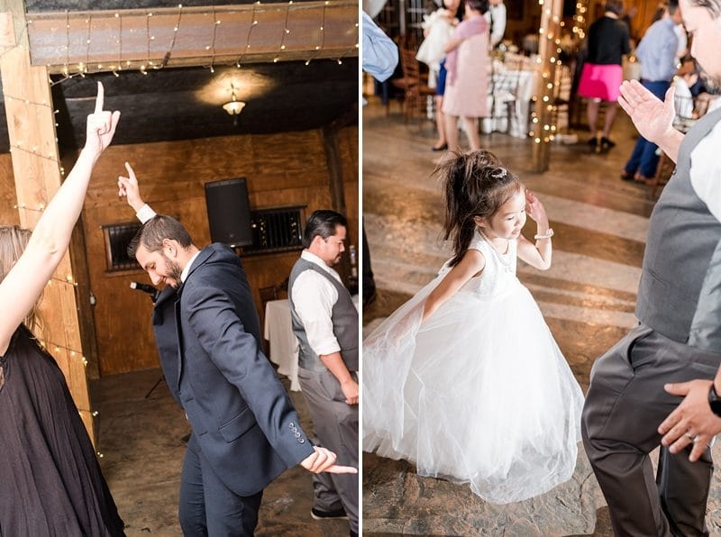 Flower girl and guest dancing at reception