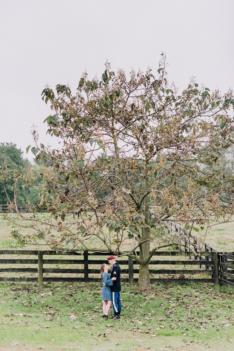 Couple kissing by tree during Fredericksburg VA Engagement session