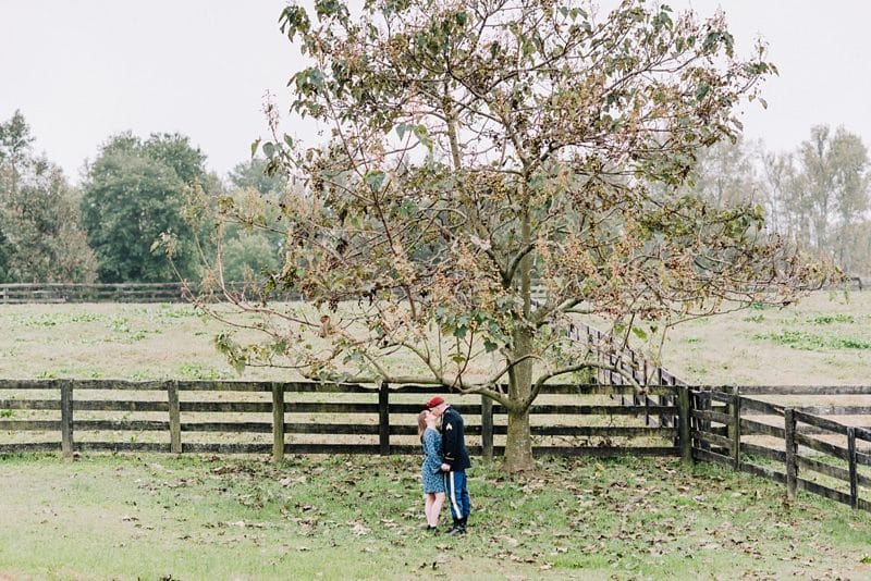 Couple kissing on farm at Fredericksburg VA Engagement session