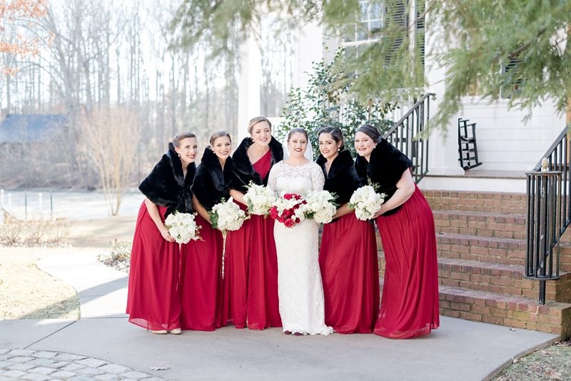 Bridesmaids in red gowns for wedding