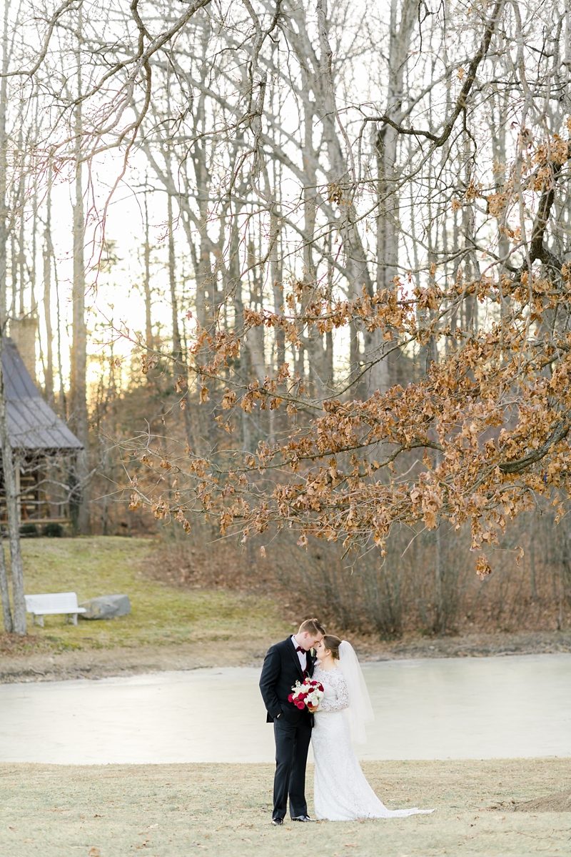 Bride and groom portrait in front of pond at Stevenson Ridge