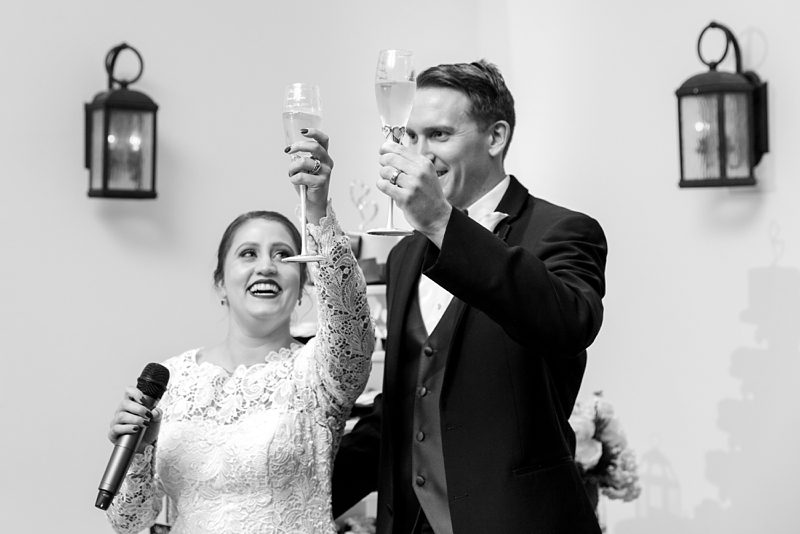 Bride and groom toasting at Stevenson Ridge wedding