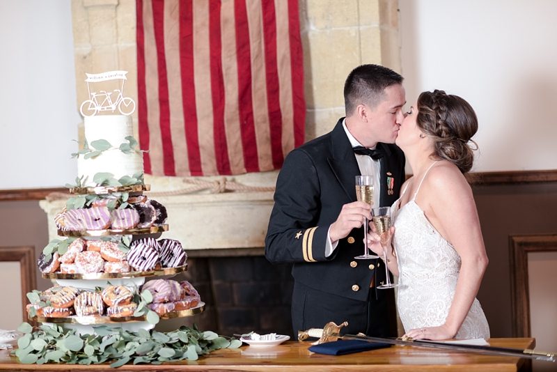 Kissing after cake cutting at Williamsburg Winery