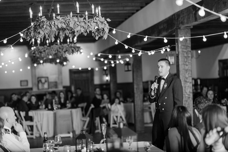 Groom giving toast to his bride