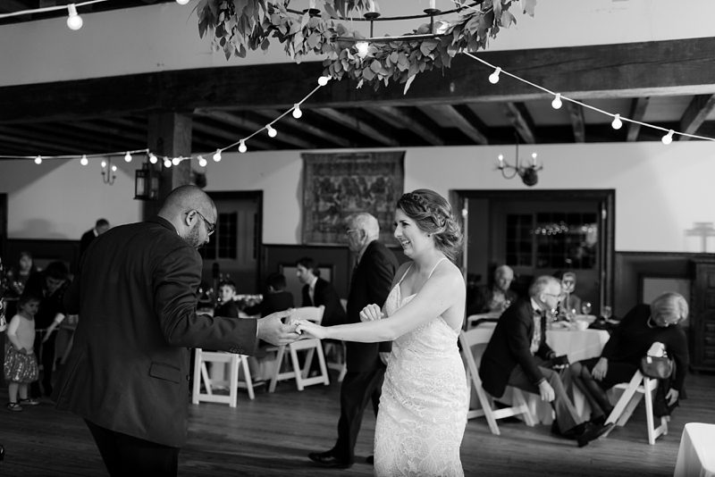 Bride and friend dancing at Williamsburg Winery