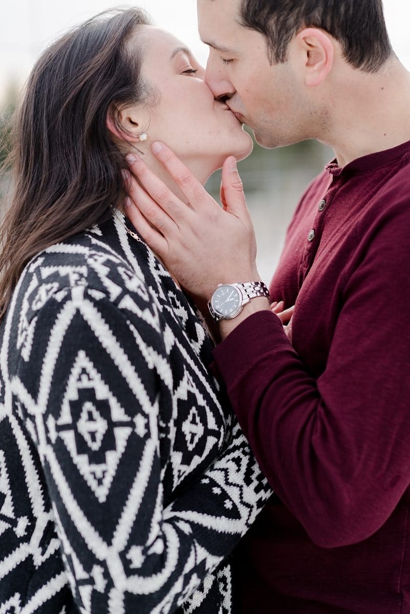 couple kissing during The Barns at Hamilton Station engagement session